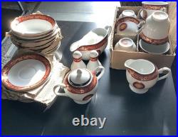 60-Piece T. Limoges Porcelain Dinnerware Set. Medusa Style Red/Gold