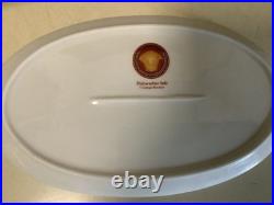 60-Piece T. Limoges Porcelain Dinnerware Set. Medusa Style Red/Gold