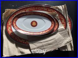 60-Piece T. Limoges Porcelain Dinnerware Set. Medusa Style Red/Gold