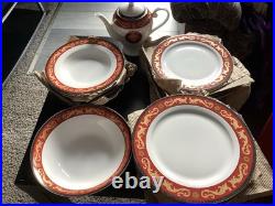 60-Piece T. Limoges Porcelain Dinnerware Set. Medusa Style Red/Gold