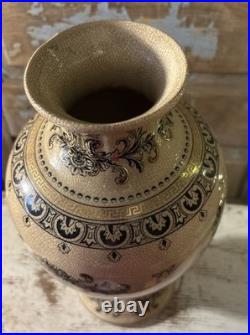 A cream-glazed Chinese porcelain vase black gold scrolling floral motifs'PCA' A cream-glazed Chinese porcelain vase black gold scrolling floral motifs'PCA'