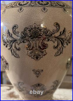 A cream-glazed Chinese porcelain vase black gold scrolling floral motifs'PCA'
