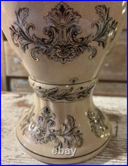 A cream-glazed Chinese porcelain vase black gold scrolling floral motifs'PCA'