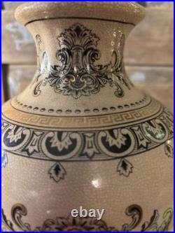 A cream-glazed Chinese porcelain vase black gold scrolling floral motifs'PCA' A cream-glazed Chinese porcelain vase black gold scrolling floral motifs'PCA'