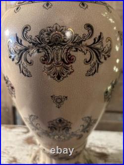A cream-glazed Chinese porcelain vase black gold scrolling floral motifs'PCA'