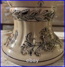 A cream-glazed Chinese porcelain vase black gold scrolling floral motifs'PCA'