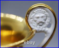 Antique France Paris Porcelain Bone China Cup and Saucer Gilded Lion Handle XIXc