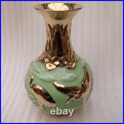 China Old Porcelain green glazed Gold color relief pine crane patterned vase
