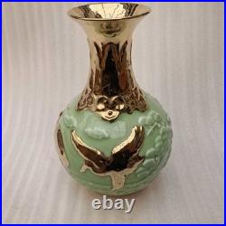 China Old Porcelain green glazed Gold color relief pine crane patterned vase