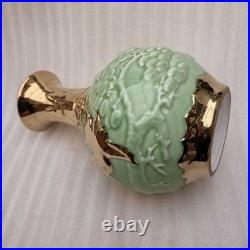 China Old Porcelain green glazed Gold color relief pine crane patterned vase
