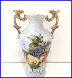 Hand painted vase with golden handles