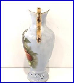 Hand painted vase with golden handles