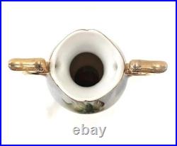 Hand painted vase with golden handles