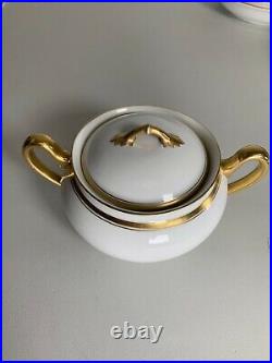 Ivory china with gold rim made by assorted designers