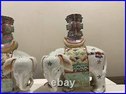 Pair Chinese. Famille Rose Porcelain Elephants Atop Vases