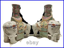 Pair Chinese. Famille Rose Porcelain Elephants Atop Vases