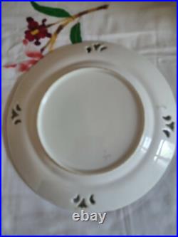 Pair Of Porcelain Plates With Openwork Floral Bouquet Decoration And Gilding Pair Of Porcelain Plates With Openwork Floral Bouquet Decoration And Gilding