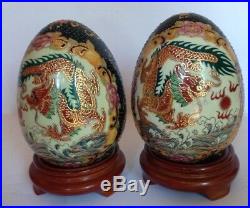 Pair VTG Chinese Hand Painted Gold Dragon Porcelain Eggs Wood base