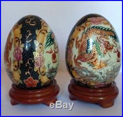 Pair VTG Chinese Hand Painted Gold Dragon Porcelain Eggs Wood base