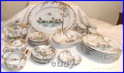 Post 1950 Kutani Porcelain 34 Piece Dinnerware Set 23K Gold Decorative Motifs