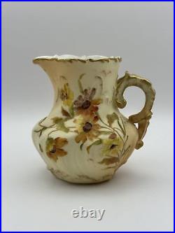 Rudolstadt Hand-Painted Porcelain Creamer with Floral Design and Gold Accents