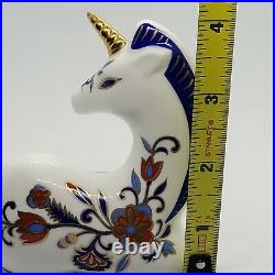 Vintage Porcelain Unicorn Figurine Gold Accents And Flower pattern Rare item