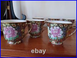 Vintage Porcelain tea cups and lidded sugar hand painted flowers gold china