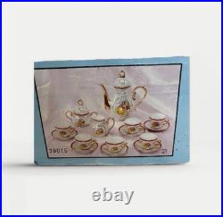Vtg Victorian Style Fine Porcelain 17 Piece Tea Set With Gold Trim Handles